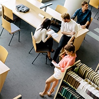 sober living | Real Recovery Education Opportunities at the University of South Florida group of students studying in library