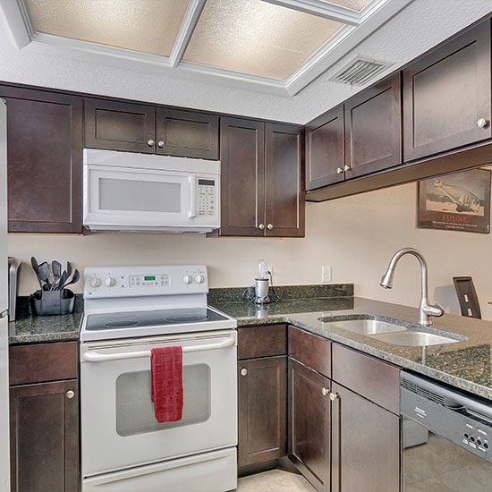 sober living homes | Real Recovery Sober Living Brandon Location upscale kitchen with granite countertops and modern appliances