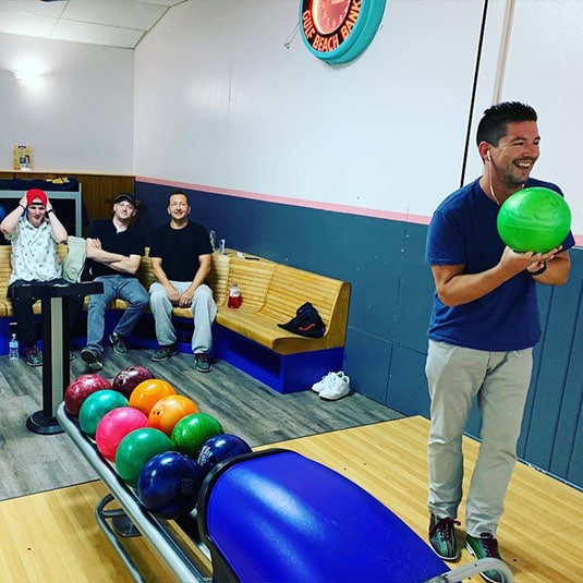 sober living | Real Recovery Sober Living for Men Program Community Activities Bonding with Friends Bowling in Sobriety