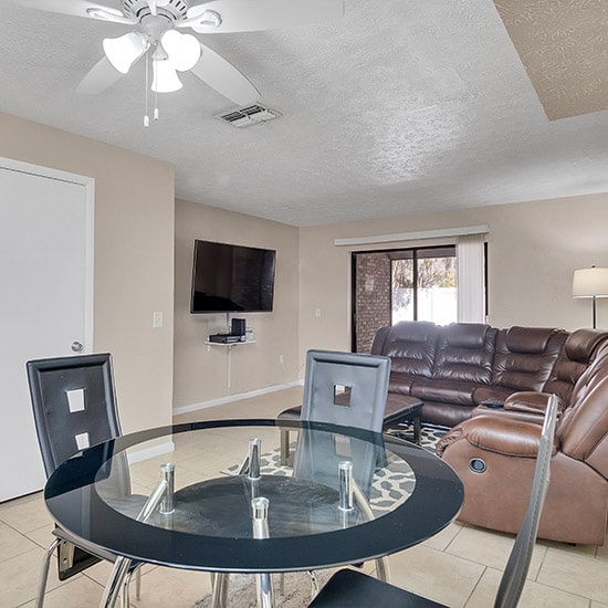 sober living | interior living room of upscale sober townhomes in Brandon with contemporary furniture and smart TVs