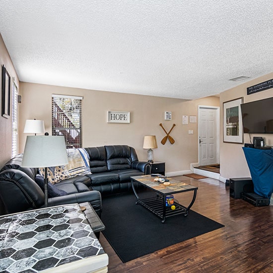 sober living | sober house interior living room with comfortable accommidations similar to home living and decor